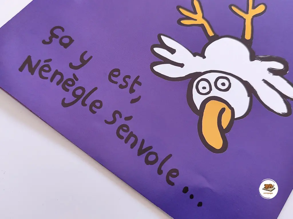 Un petit aigle qui tombe d'une montagne. On peut lire : "ça y est, Nénègle s'envole"